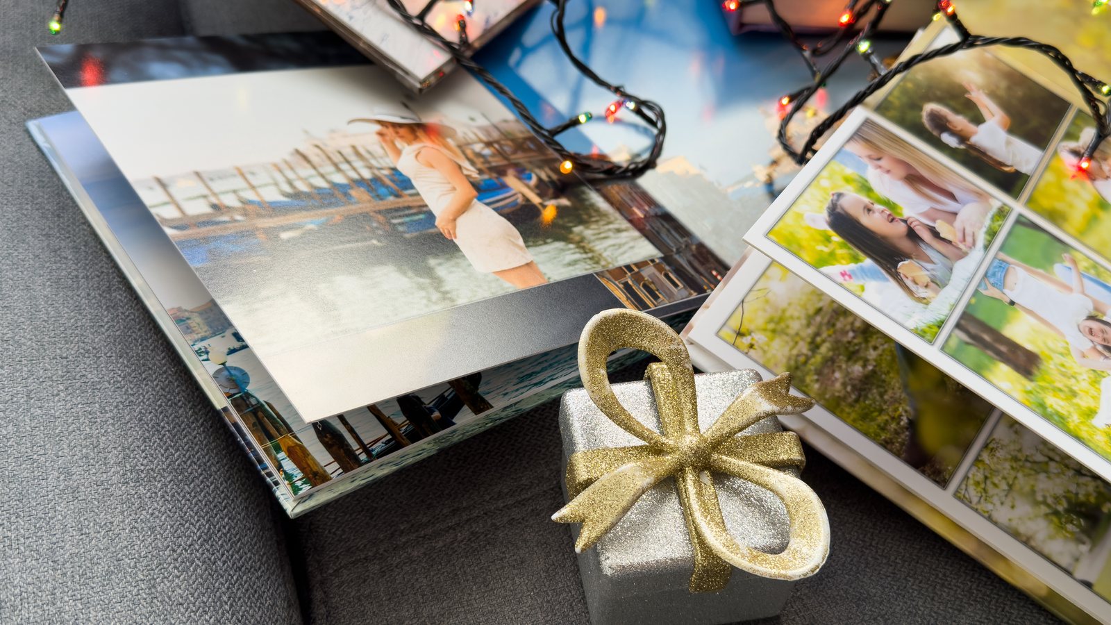 Printed photo albums and selected photographs prepared for client delivery